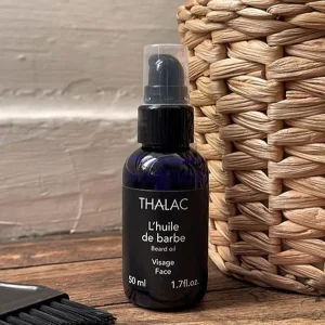 flacon noir d'huile thalac avec couvercle transparent