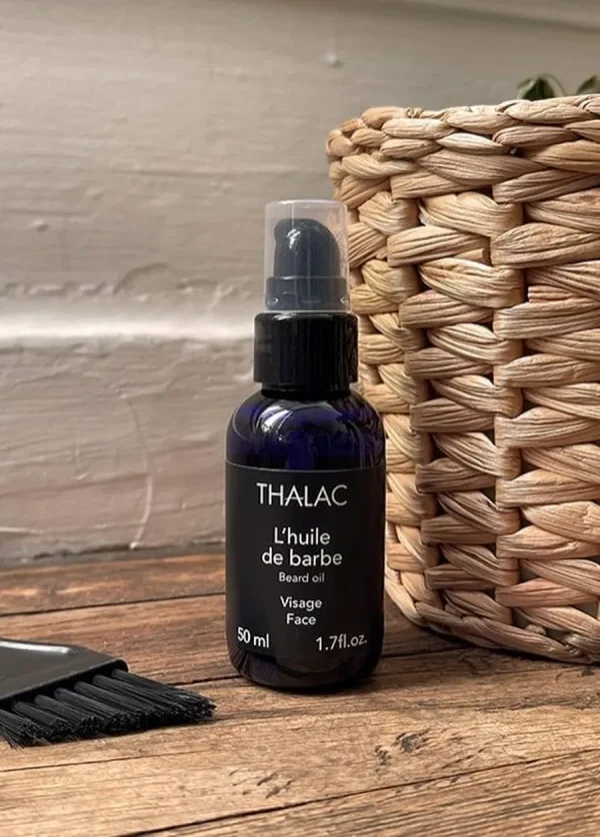flacon noir d'huile thalac avec couvercle transparent